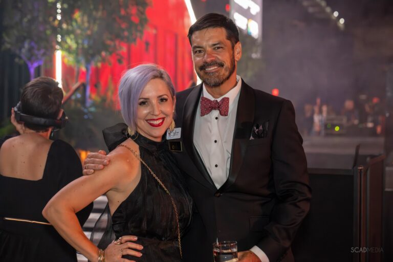 Couple posing near the stage