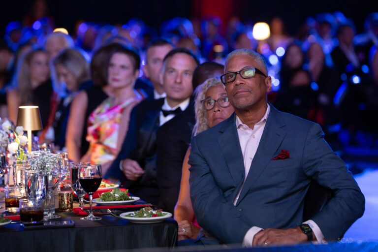 Guests watching the program from their table