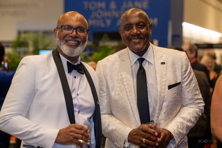Two guests in white dinner jackets
